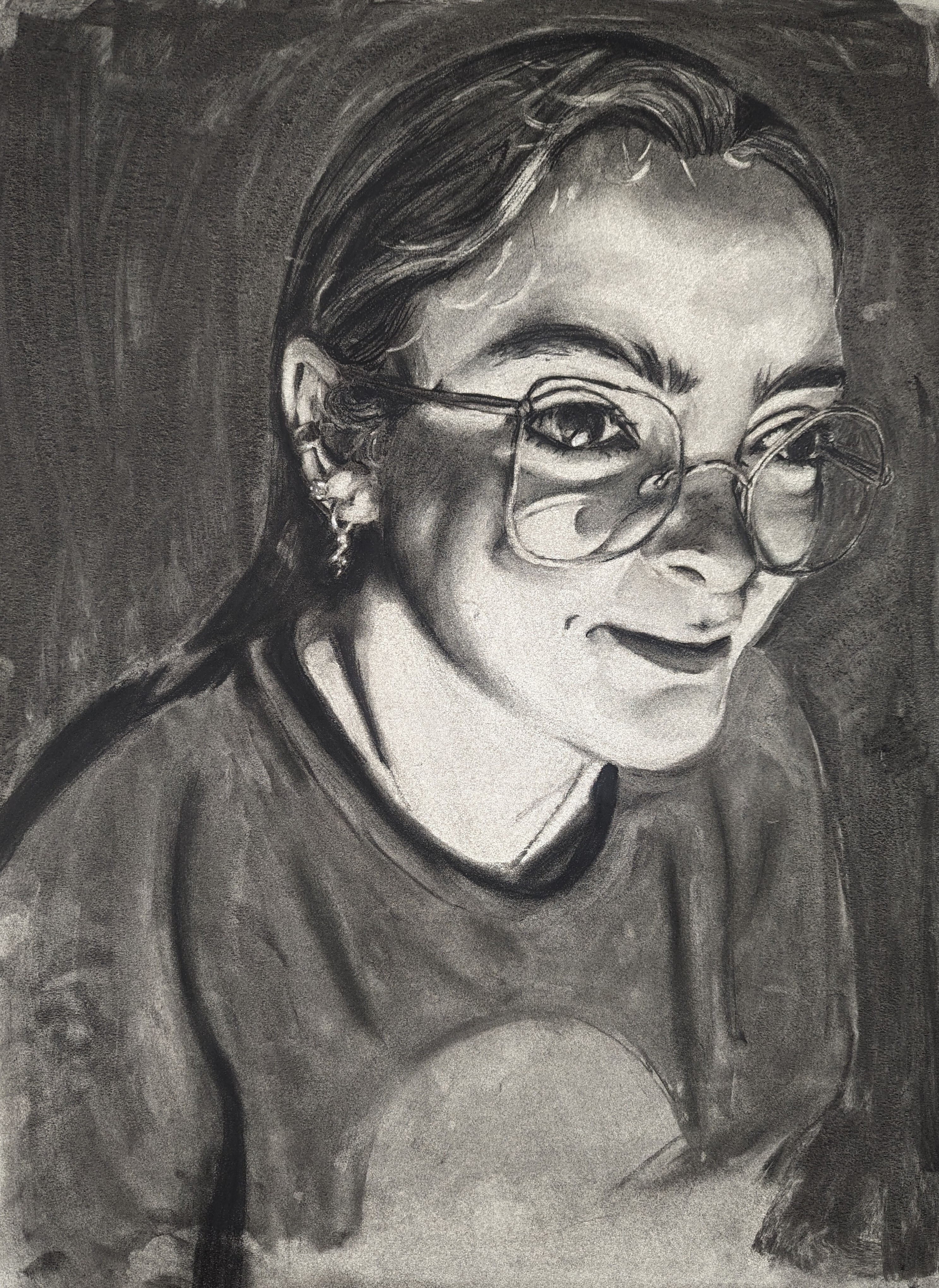 A woman head shot in severe lighting.