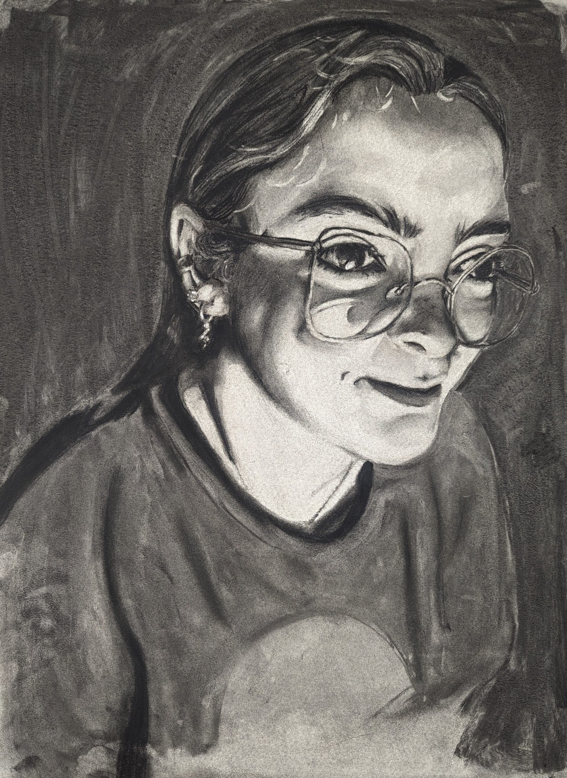 A woman head shot in severe lighting.
